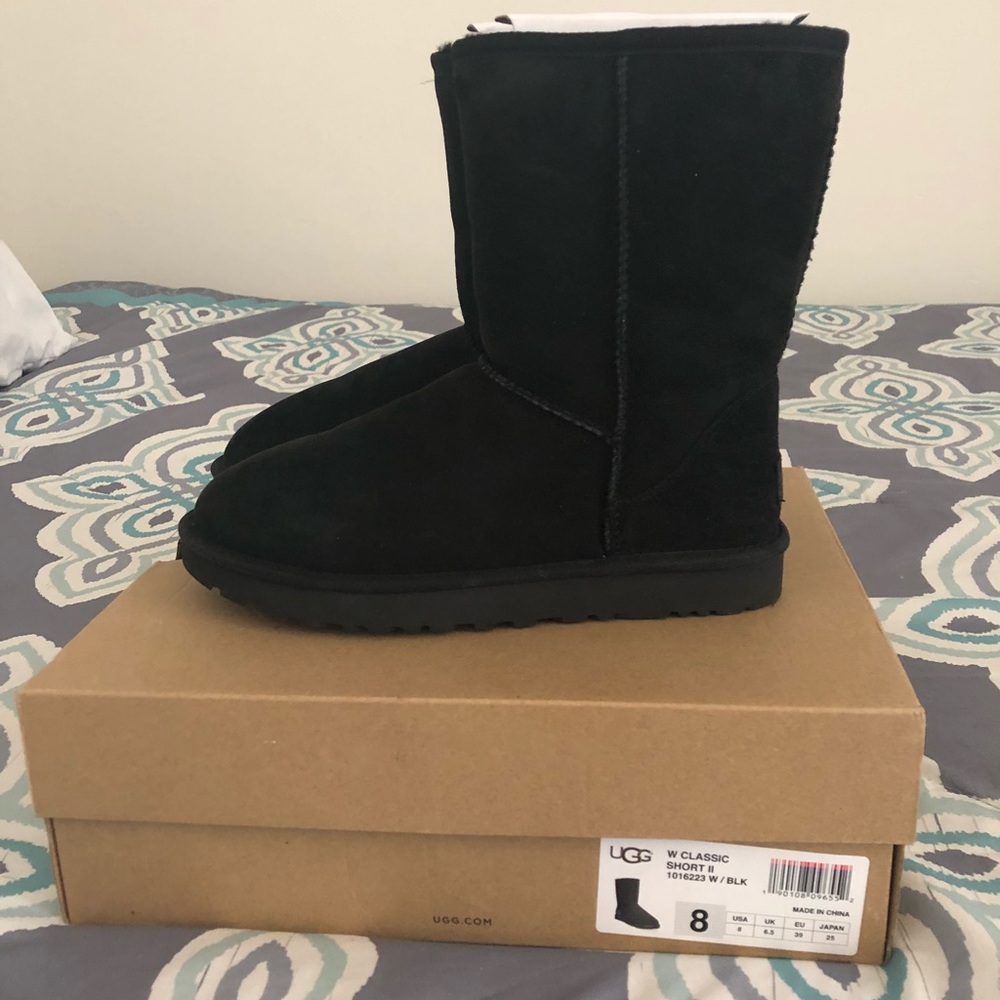 BLACK UGGS WORN MAYBE TWICE THEY ARE TOO BIG ON ME